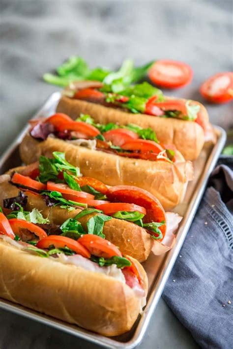 A hearty sub sandwich filled with spicy Italian peppers and meats