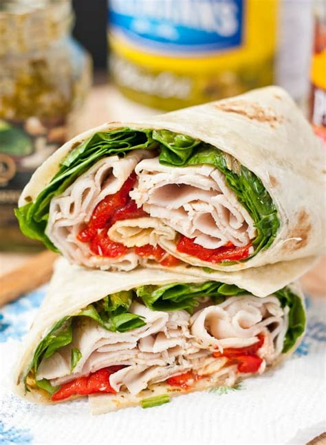 A delicious turkey wrap with spicy peppers and avocado