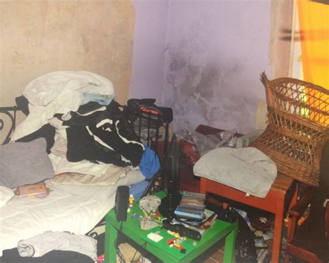 A photo of squalid living conditions in a neglected building