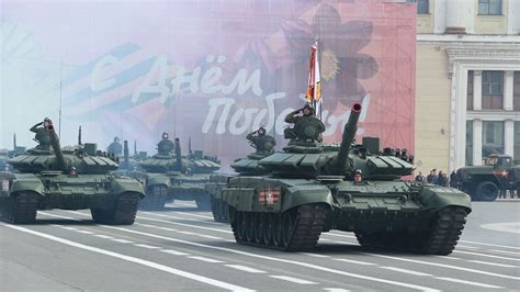 Tank in a Fourth of July Parade at Night