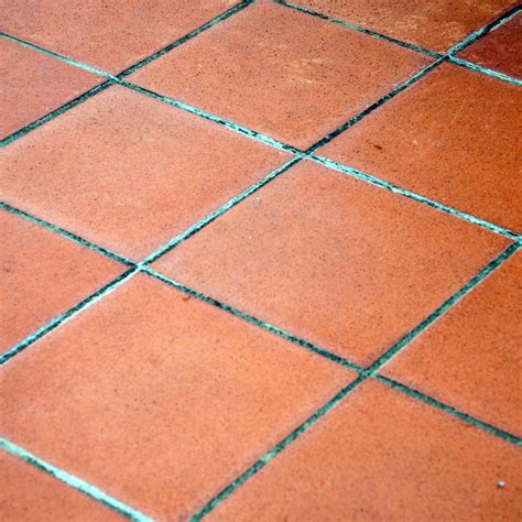 Terracotta-colored tiles in a bohemian-inspired bathroom