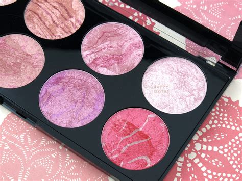 A transparent makeup palette featuring a variety of blush shades