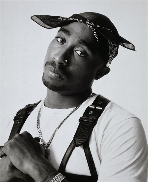 Tupac Shakur, a famous rapper who lost his life to gun violence