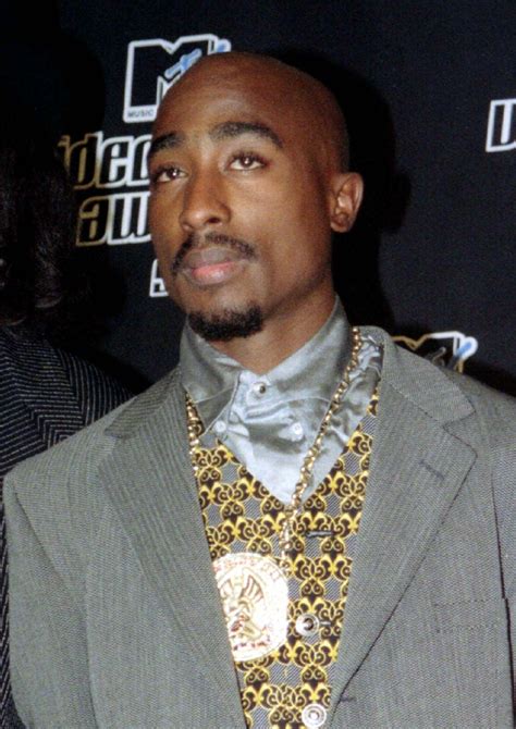 Tupac Shakur, a famous rapper who lost his life to gun violence