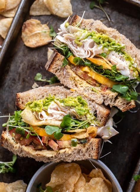 Turkey and avocado sub sandwich with lettuce and tomato