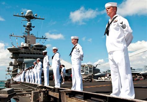 A photo of the USS 74 aircraft carrier's crew