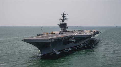 USS George Washington CVN 73 sailors at work