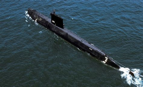 USS Nautilus loading a torpedo