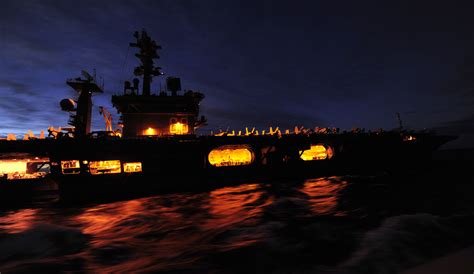 USS Nimitz at night