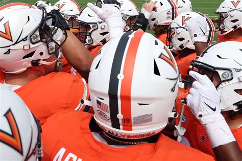 UVA Football Team Huddle