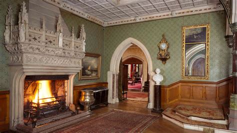 A photograph of a Victorian-era interior featuring rich colors and intricate patterns