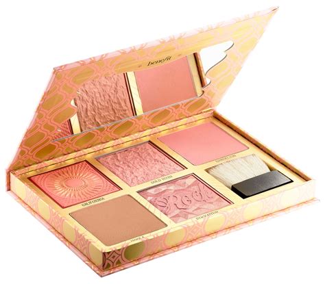 A beauty enthusiast holding a transparent makeup palette, with a variety of shades and textures visible