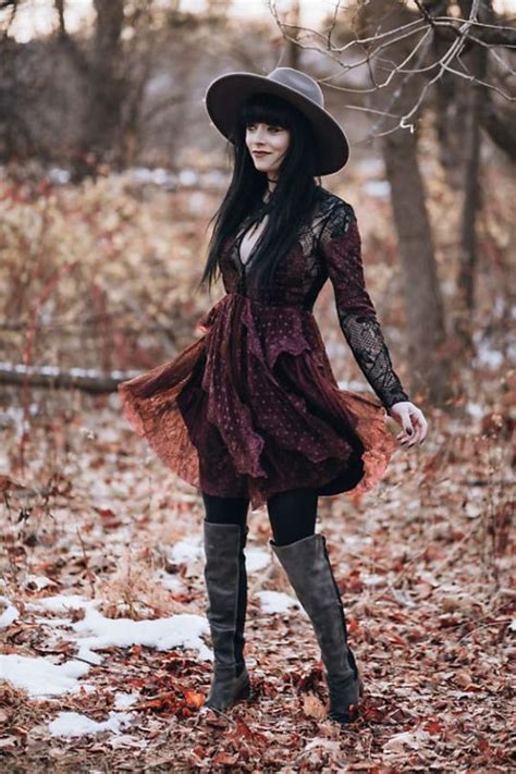 A witchy-inspired outfit featuring deep blues and purples