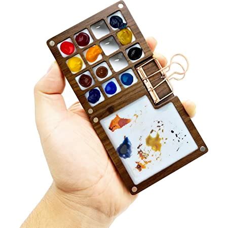 Wooden watercolor palette with paint reservoir