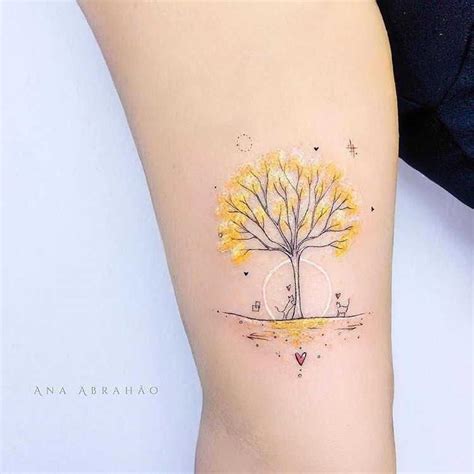 Yellow ink tattoo